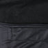 Close-up of two black fabrics from the Condor Core Softshell Vest. The upper fabric is soft and fleecy, ideal for comfort, while the lower section features a textured, woven pattern with visible stitching—perfect for bushcraft or EDC.